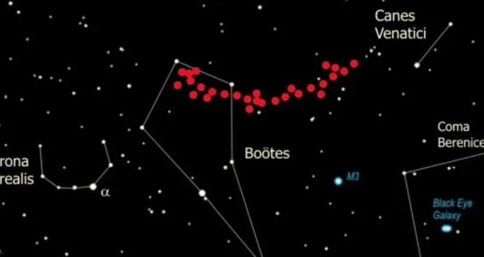 Астрономы обнаружили загадочную дугу из галактик в далеком космосе